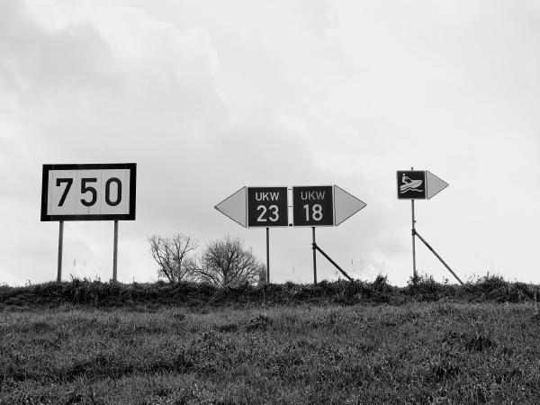 Week 46 - Signs. Information for navigation at Rhine kilometer 750. Here the VHF radiotelephone channels defined for the respective sections of the Rhine change for communication between ships on the river. The sign on the right indicates that the Rhine may be navigated by jet ski from here downstream.