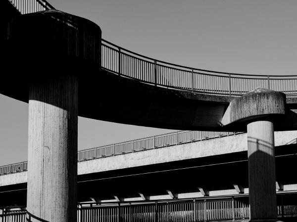 Week 49 - Concrete and steel. At the Rhine dike, circular pedestrian and cyclist ramps lead onto the Rhine bridge on each side of the airport bridge. The only place on the entire route where concrete and steel can dominate the picture.